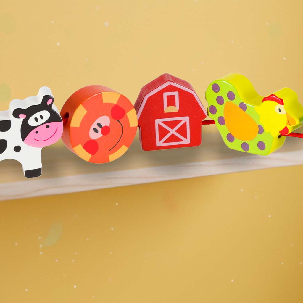 Dřevěné navlékací kostky – Farma se zvířátky + hrací tabulka